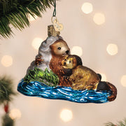 Old World Christmas Otter With Pup Ornament