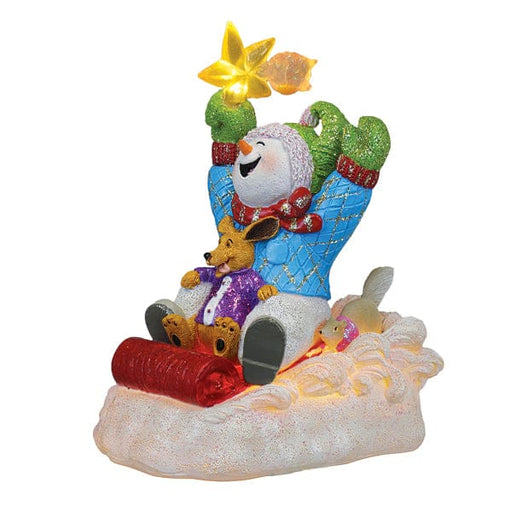 Old World Christmas Star Powered Snow Boy Lighted Figurine