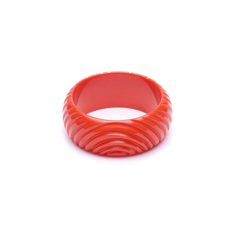 Quirks! Bracelets Wide Papaya Heavy Carve Fakelite Bangle by Splendette