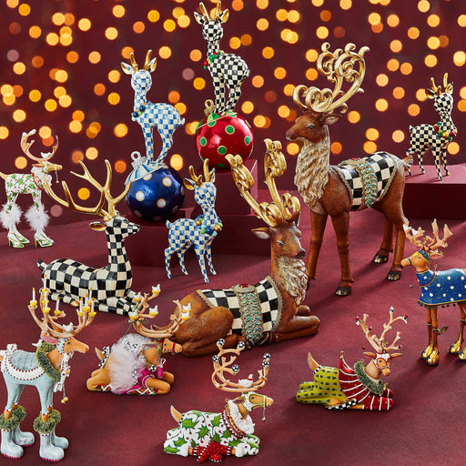 Quirks! Figurines Dash Away Sitting Vixen Reindeer Figure by Patience Brewster