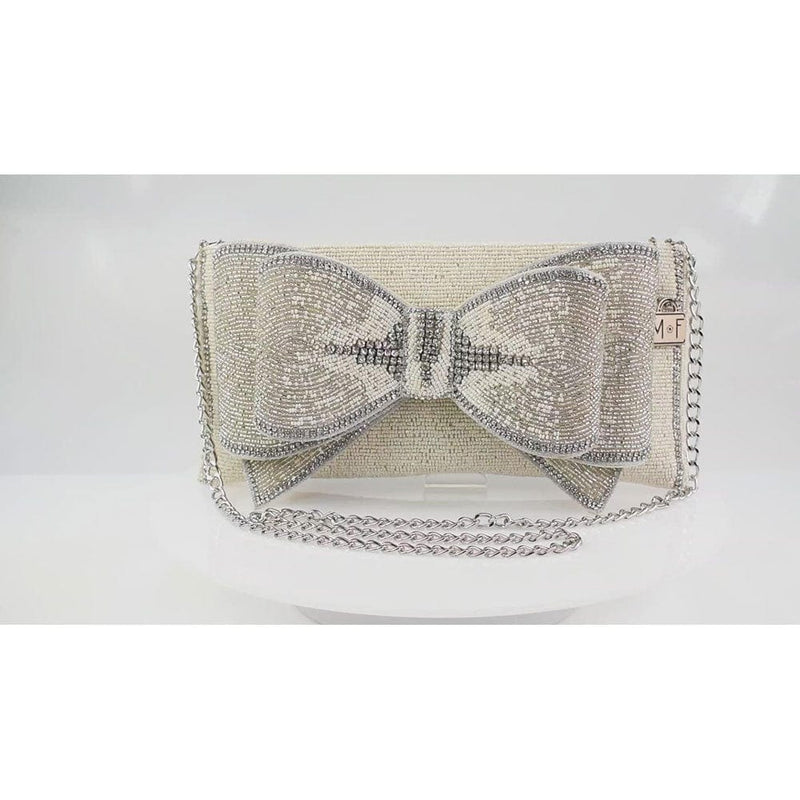 Quirks! Handbags Fancy Bow Clutch by Mary Frances