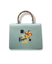 Quirks! Handbags Kewpie® X TOBS Hula Bamboo Handle Purse
