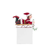 Quirks! Katherine's Collection, Christmas Laying Elf on Sled Stocking Holder by Katherine's Collection
