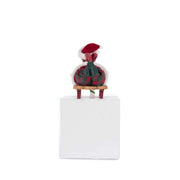 Quirks! Katherine's Collection, Christmas Laying Elf on Sled Stocking Holder by Katherine's Collection