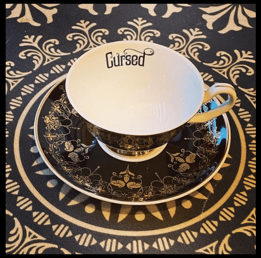 Quirks! tea cup Black Nouveau Cursed Insult Teacup and Saucer by Miss Havisham
