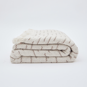 The Loomia Throw Blanket Lumia Throw Blanket