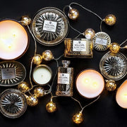 Voluspa Voluspa Blond Tabac 2 wick candle in a decorative oval tin