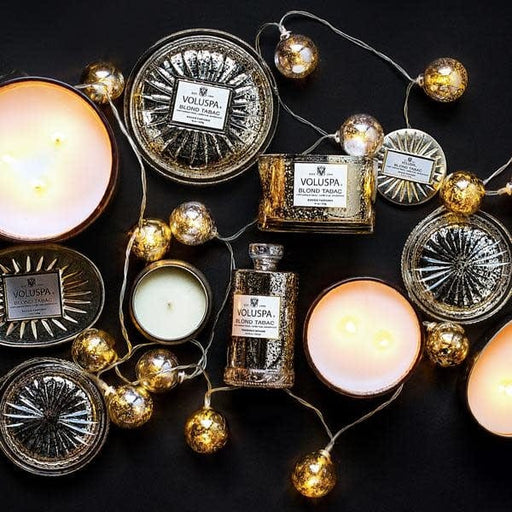 Voluspa Voluspa Blond Tabac 2 wick candle in a decorative oval tin